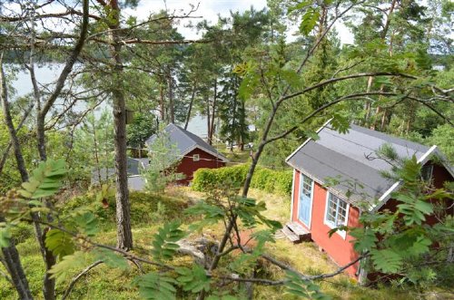 Gäststugan, stora huset och utsikten